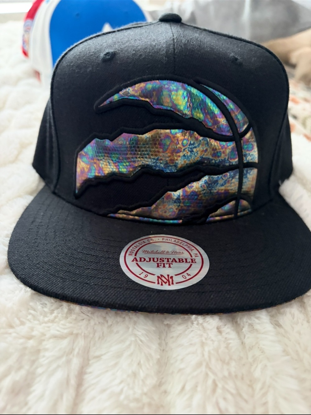 Mitchell & Ness Black Snapback with Iridescent Raptors Logo